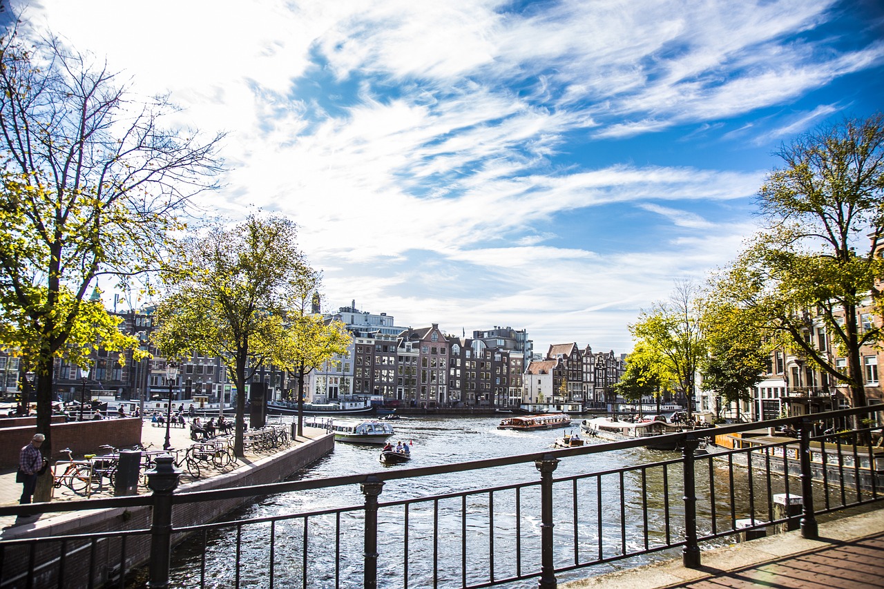 Amsterdam canal under an autumn sky
