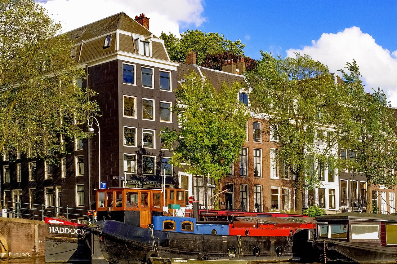 Colorful houseboats on an Amsterdam canal